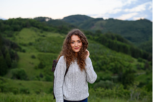 Young tourist woman traveller with, a Person Photo by HalfPoint