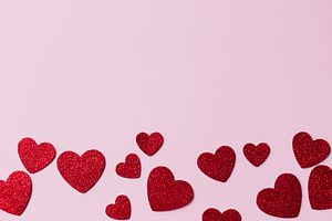Happy Valentine's day! Stylish red glitter hearts flat lay on pi, a Holiday Photo by Sonjachni