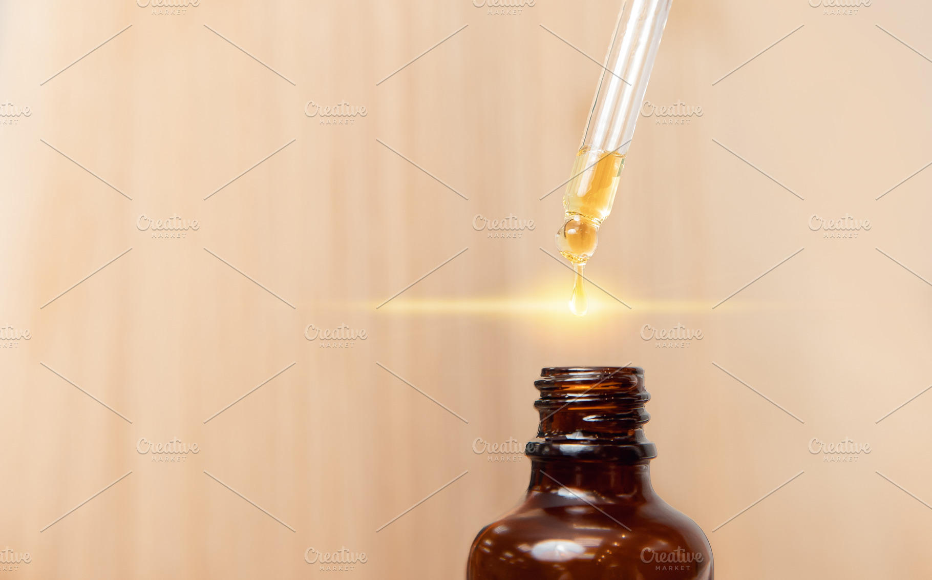 Closeup drop of oil restore and rec stock photo containing hair and oil, a Beauty & Fashion Photo by Parilov