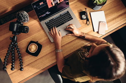 Young female vlogger editing stock photo containing accessories and blog, a Person Photo by Jacob Lund