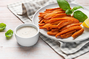 Sweet potato fries with dip, basil, and lemon, a Food & Drink Photo by Olena Rudo