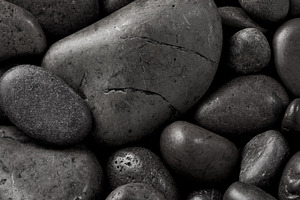 Black stone background containing stone, stones, and rock