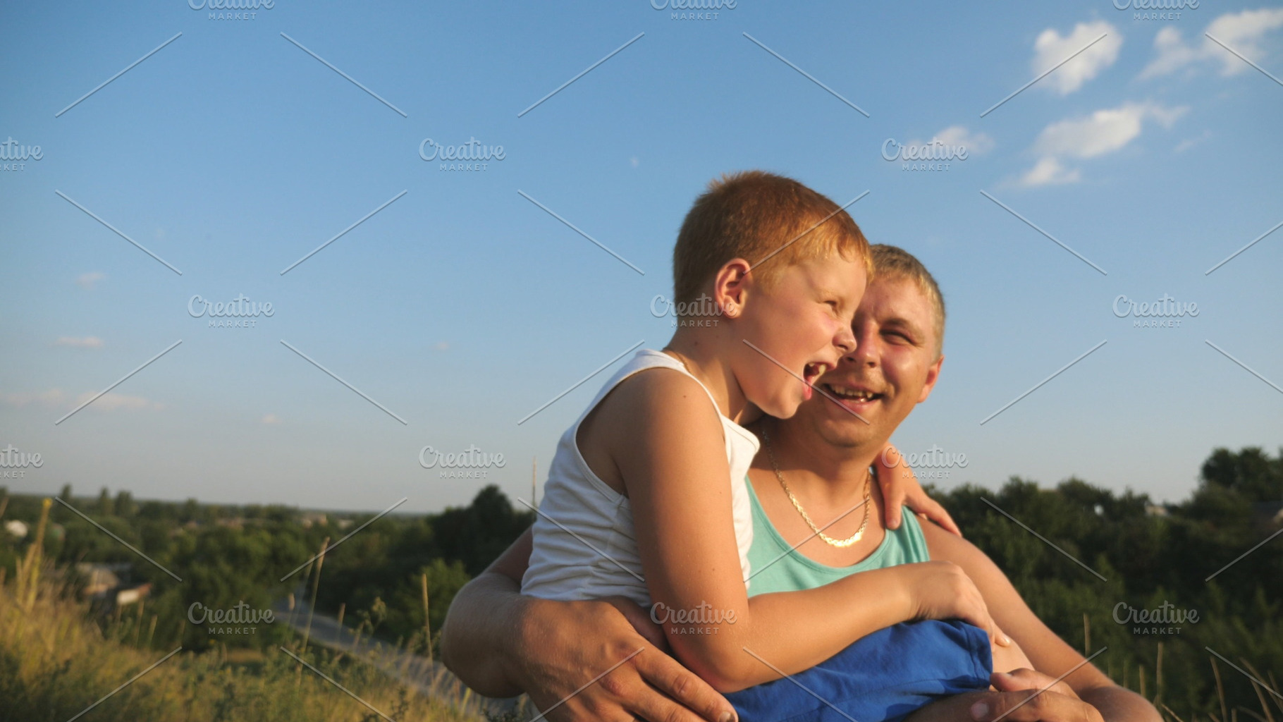 Close up of smiling boy sitting at featuring adult, background, and boy, a Person Photo by Footage Autor