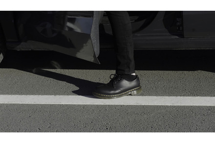 Man getting into car on drivers side, a Person Photo by Media Whale Stock