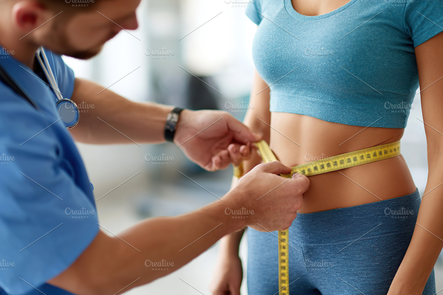 Healthcare professional measuring waist circumference for patient assessment in, a Sports & Recreation Photo by AlyaAnd