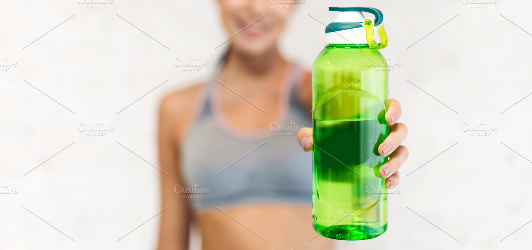 Portrait sport beauty body slim woman drinking water from a bott, a Person Photo by Art_Photo