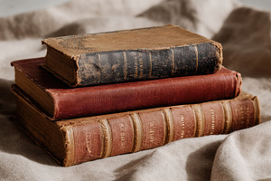 Small stack of antique books, a School & Education Photo by Virgo Studio