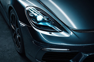 Car parked in garage at night, a Photo by Beautiful things