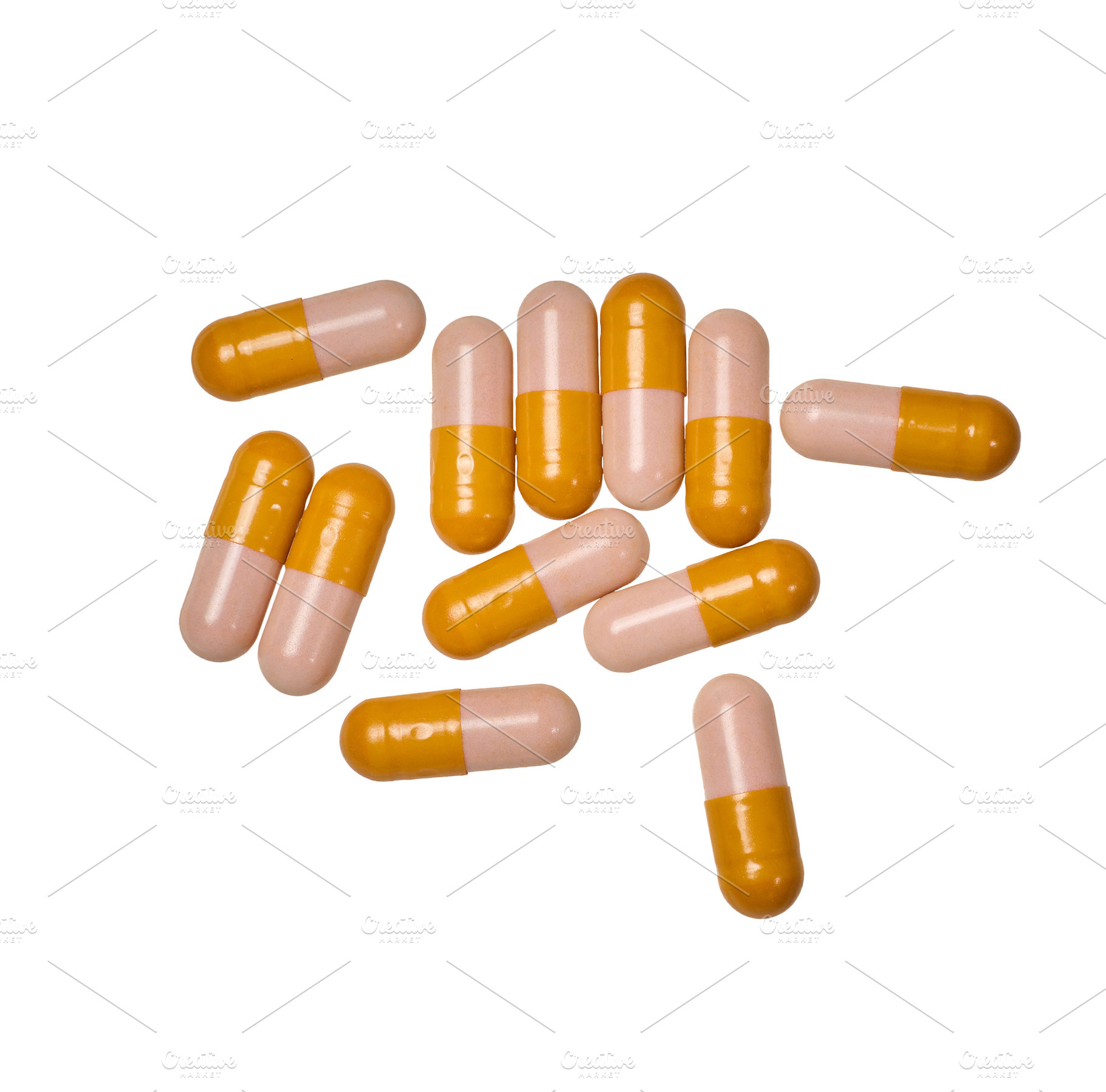Scattering of medical capsules, two-color shell of yellow and pi, a Health & Medical Photo by ndanko