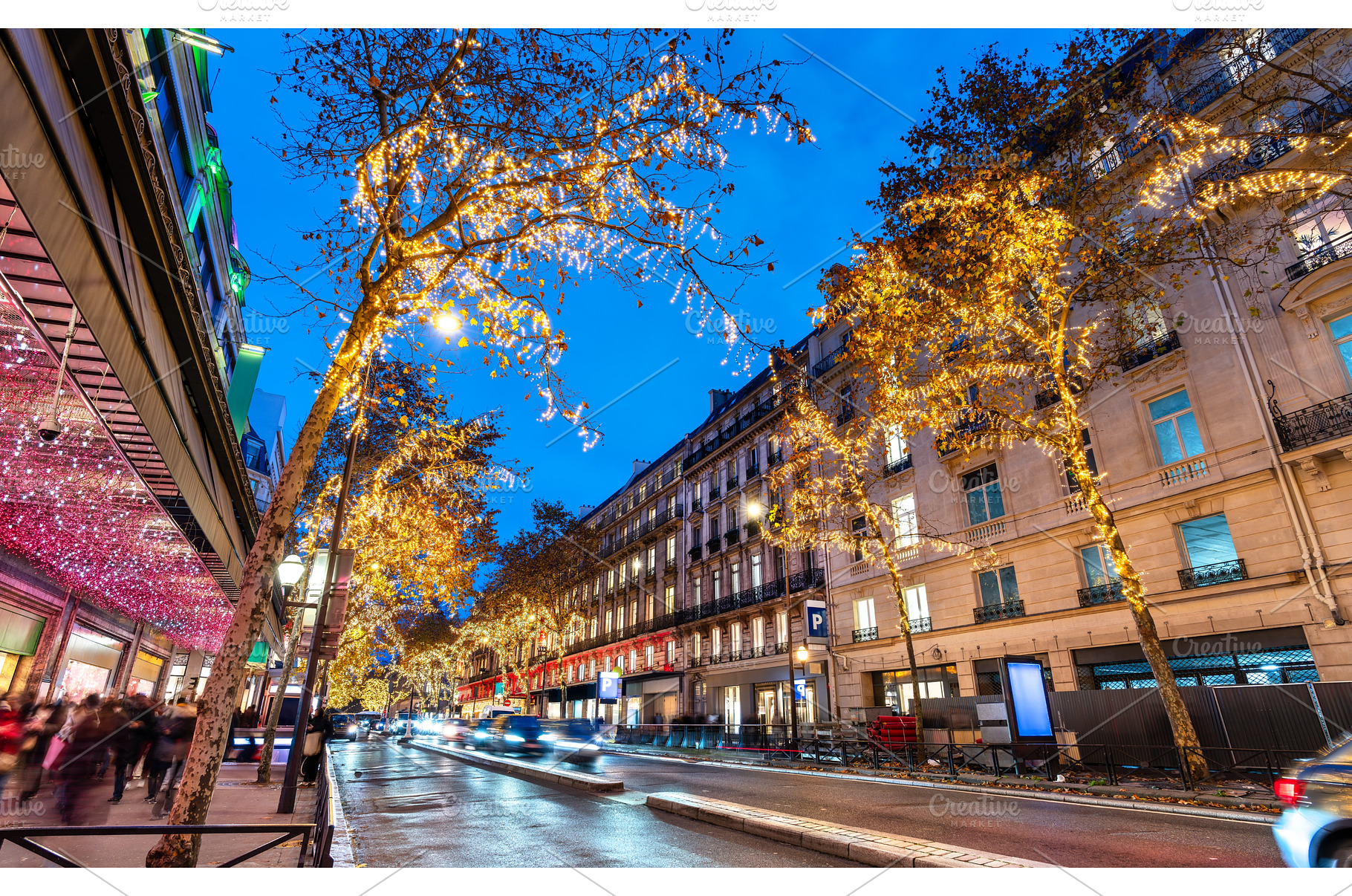 Illuminated Christmas lights on, a Holiday Photo by Leonid Andronov