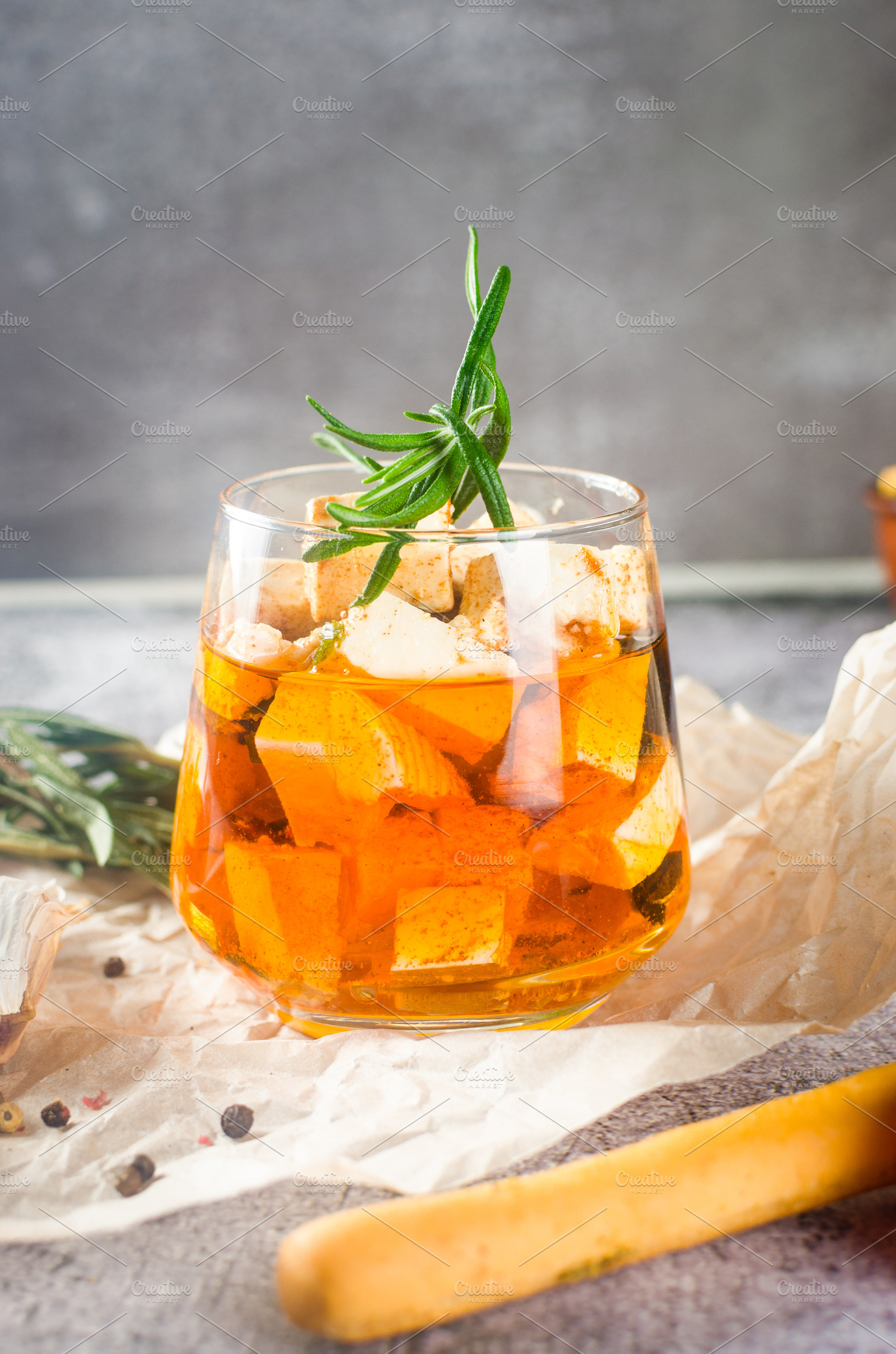 pieces of natural feta cheese covered in olive oil in a jar, tom, a Food & Drink Photo by vimart