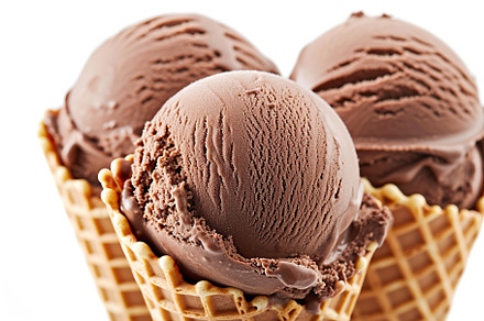 Chocolate ice cream in waffle cones on white background, a Food & Drink Photo by AlyaAnd