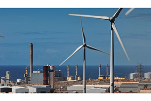 Wind turbines rotating near power, an Industrial Photo by Goinyk