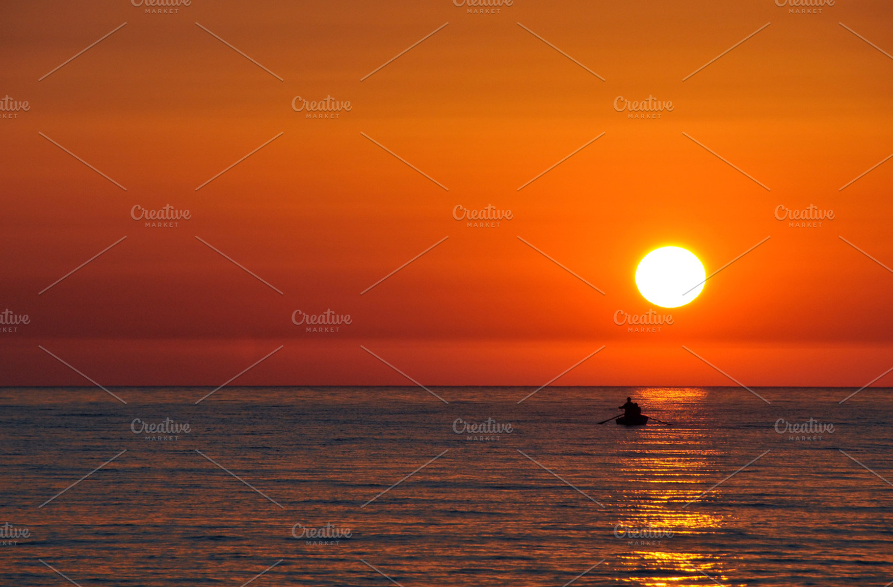 Sunset and boat, a Nature Photo by BOOCYS