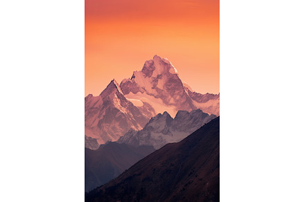 Silhouette of jagged mountain peaks, a Nature Photo by Neirfy