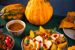 Thanksgiving day dinner with turkey, a Food & Drink Photo by Yulia Furman