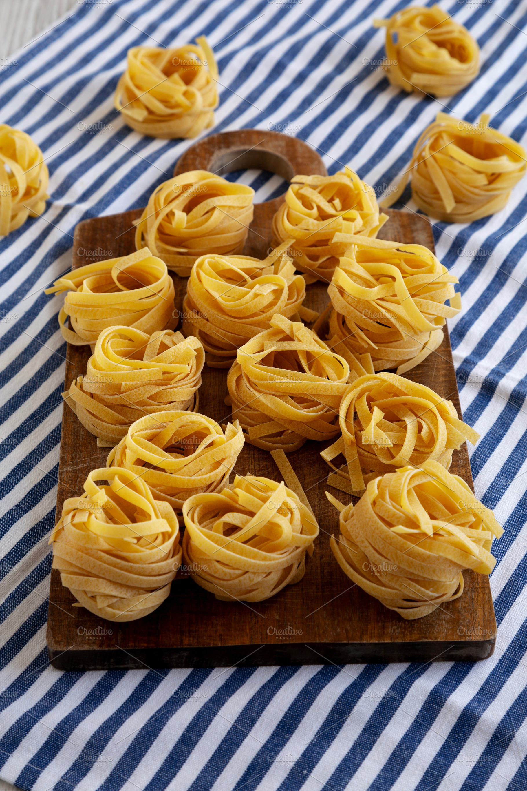 Raw Organic Dry Tagliatelle Pasta Ready to Cook, a Food & Drink Photo by LiudmylaChuhunova