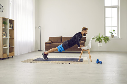 Athletic man is doing push up, a Sports & Recreation Photo by StudioRomantic