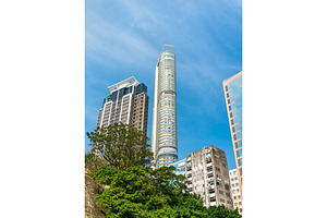 Buildings in the kowloon district of hong kong china containing street, an Architecture Photo by Leonid Andronov