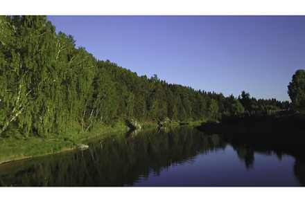 A serene and tranquil river flows, a Nature Photo by Media Whale Stock