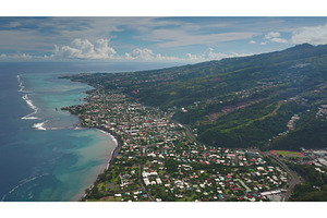 Drone flying over coast of Tahiti, a Nature Photo by Goinyk