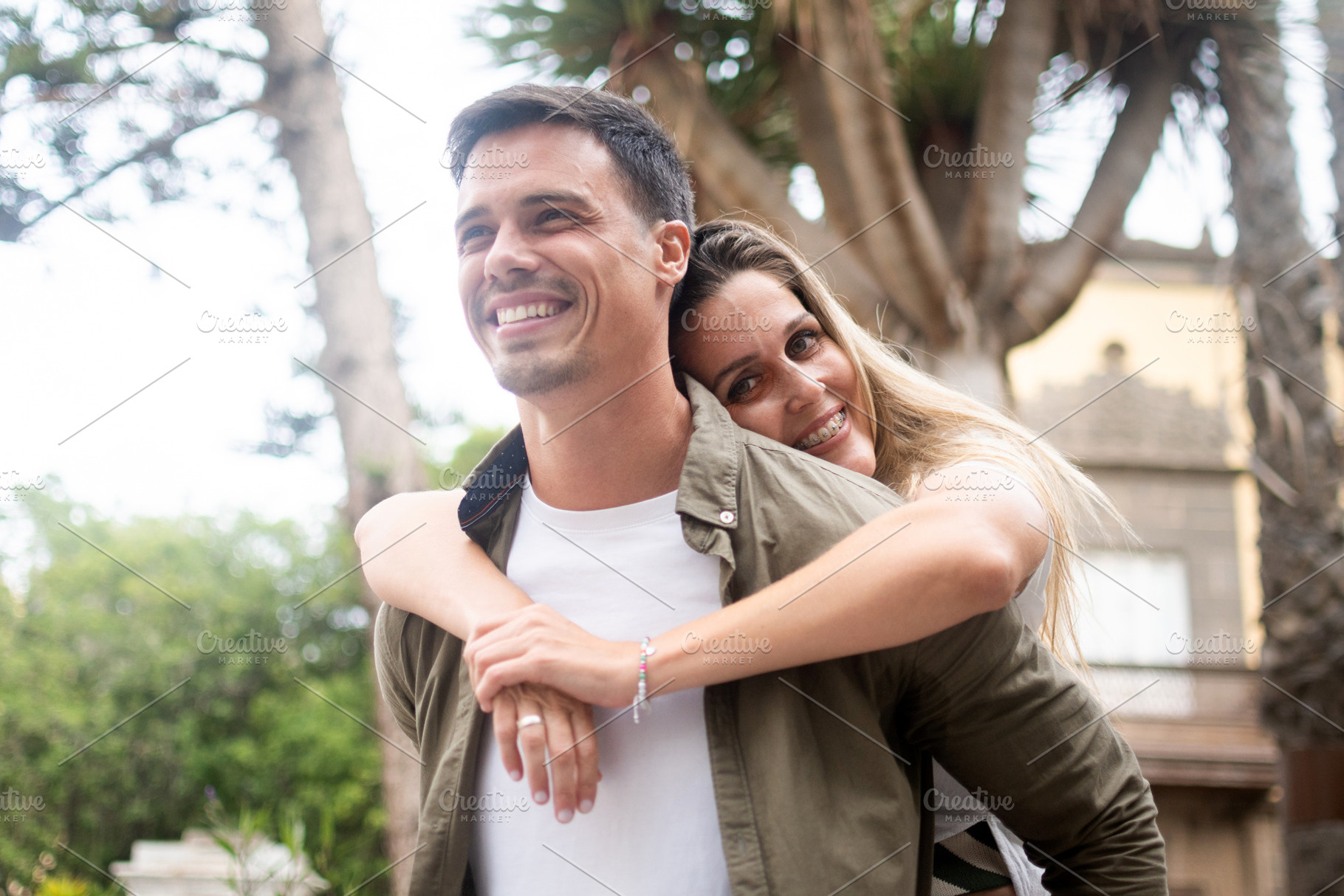Affectionate couple embracing during romantic city getaway, a Person Photo by etorres69