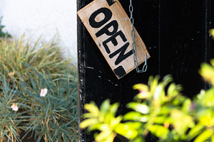 Wooden open sign on a café stock photo containing open and sign