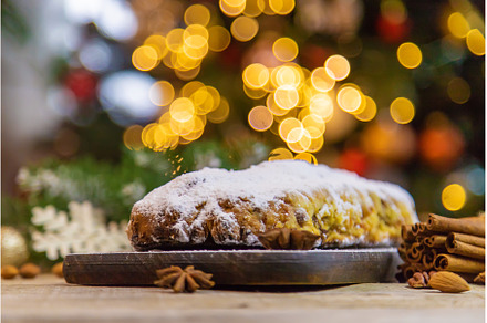 Stollen Christmas cake on the table, a Holiday Photo by yanadjana