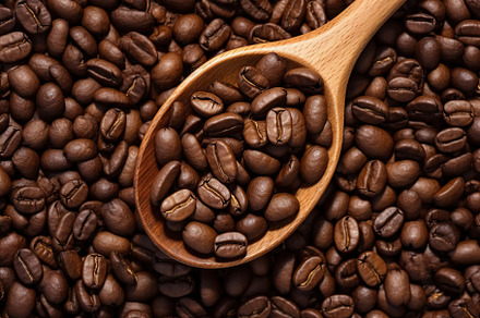Coffee beans with wooden spoon. Generative AI, a Food & Drink Photo by AlyaAnd