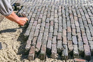 Paving a road is hard work