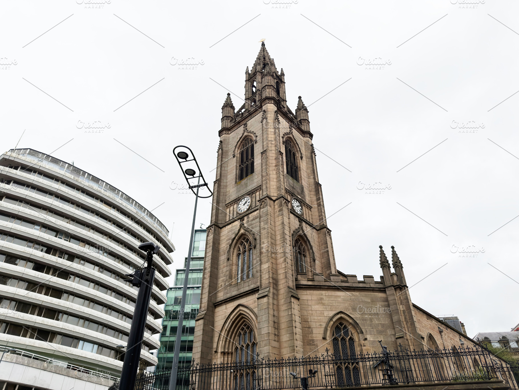 Historic Gothic church clock tower in Liverpool UK with stone fa, a Photo by AS photostudio