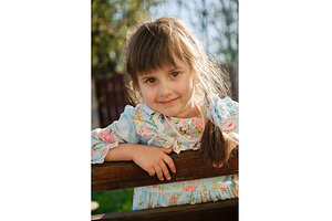 Joyful young girl resting on a, a Person Photo by Rohan Photography