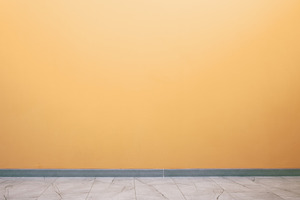 Minimalist yellow wall with clean marble floor, ideal blank back, a Background Photo by Ales Munt