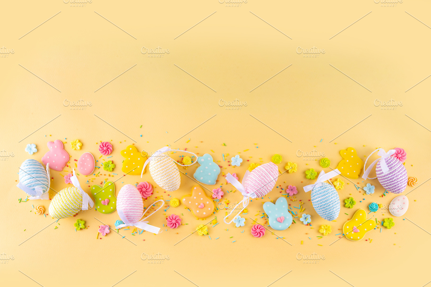 Cute and bright pastel colored Easter eggs and bunny background, a Holiday Photo by Rimma