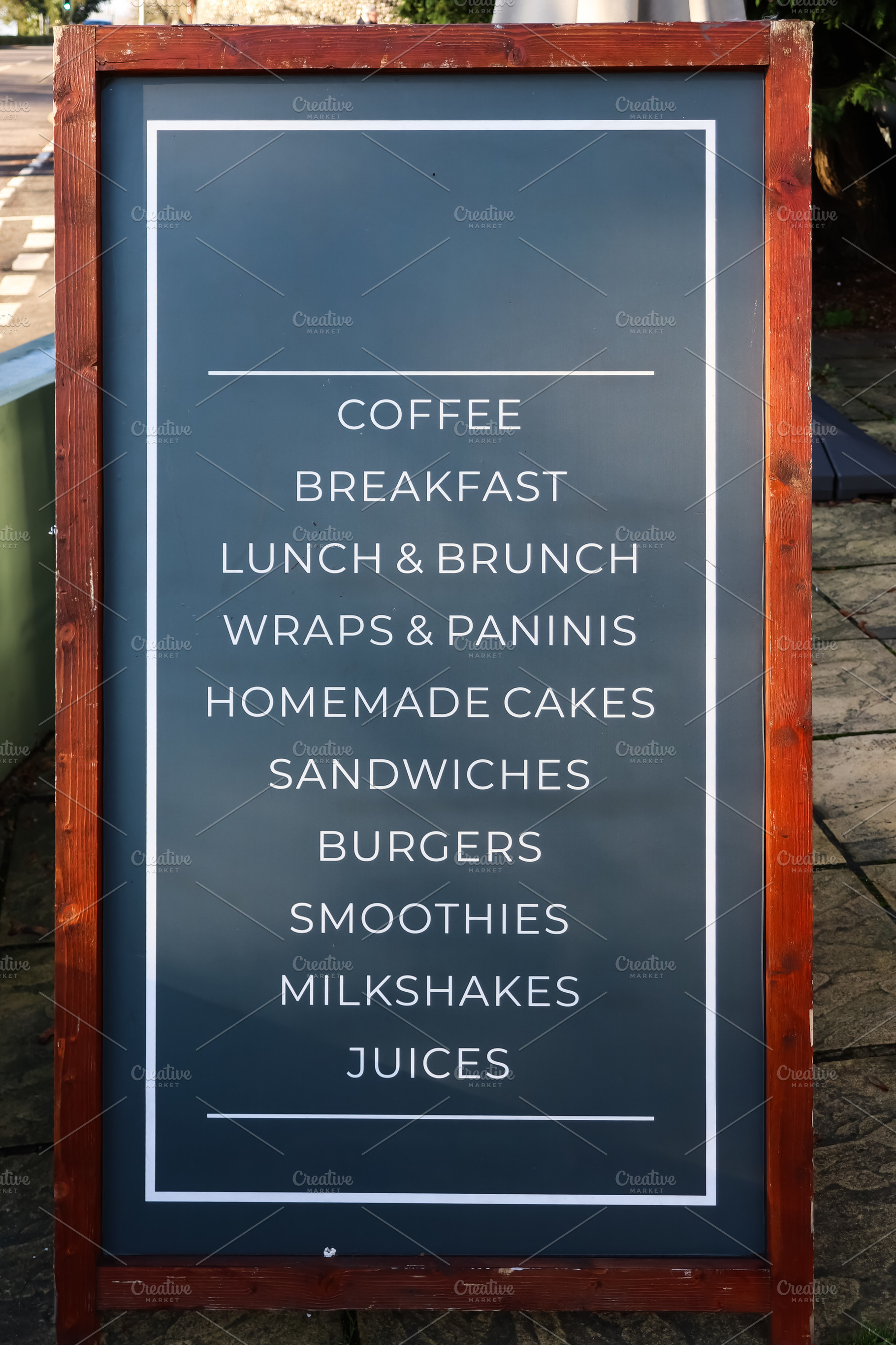 Cafe menu board listing coffee, breakfast, lunch, brunch, wraps,, a Photo by Studio ANNA