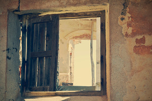 Window of an abandoned house featuring ruins, building, and architecture