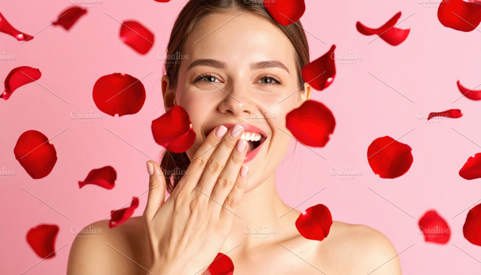 Happy woman smiling with falling rose petals, a Person Photo by Davizro's Market