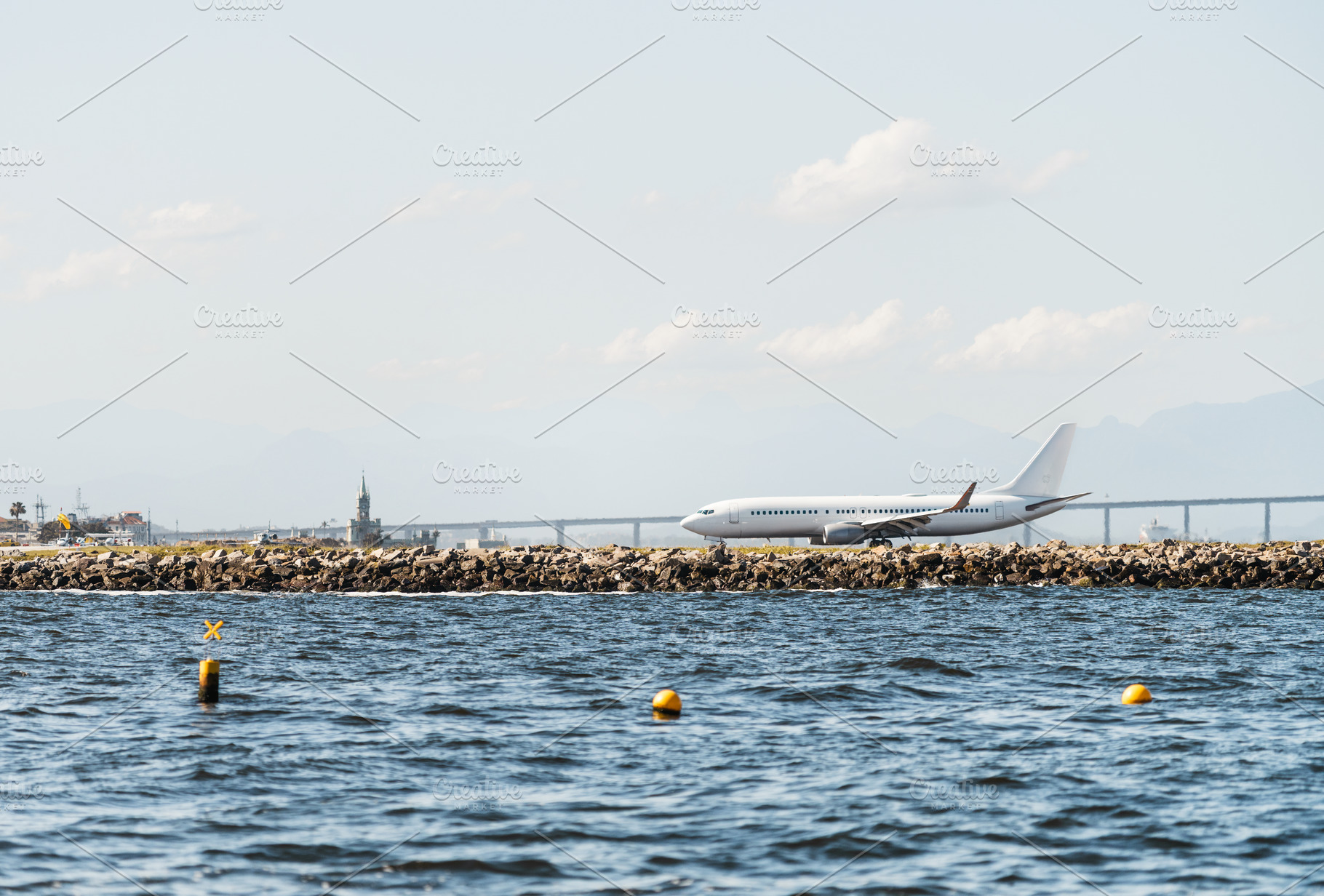 Airplane near sea runway, a Transportation Photo by SkyNext