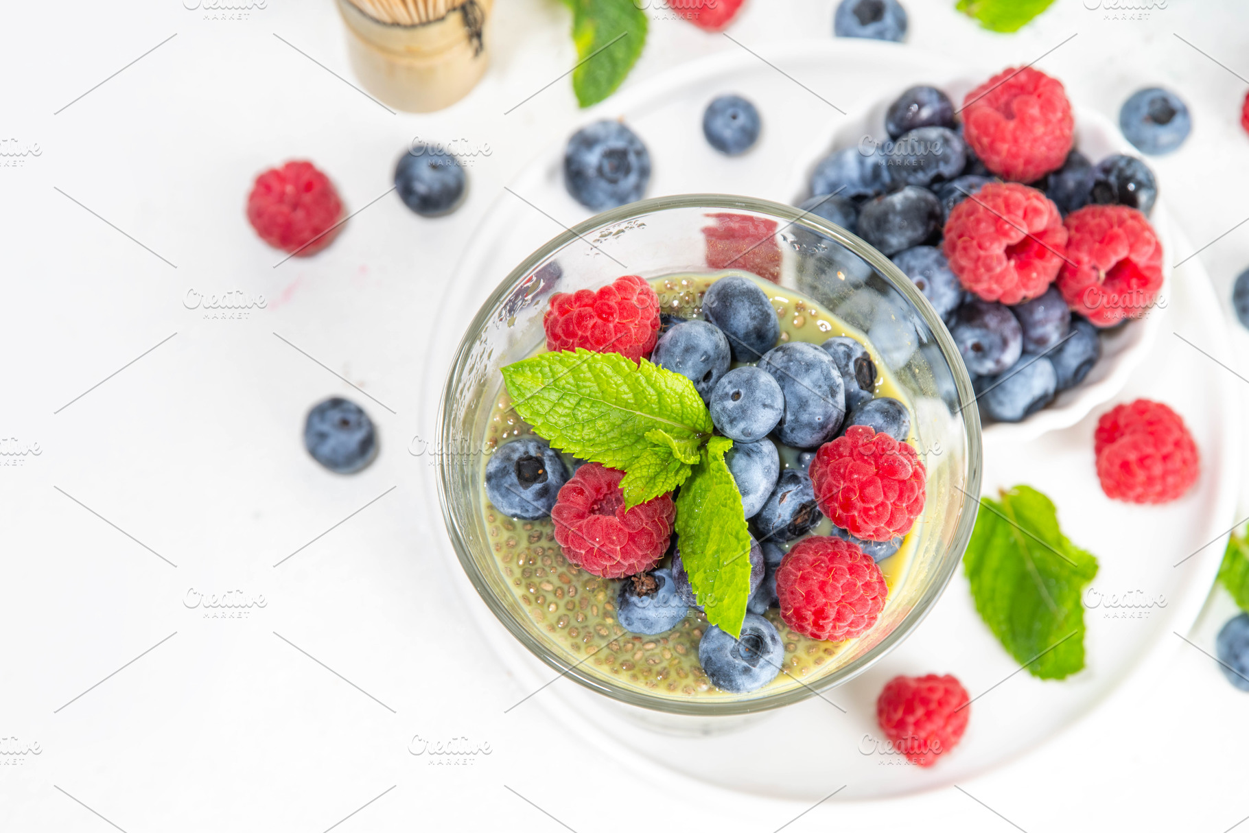 Healthy breakfast chia pudding with raspberry and blueberry, a Food & Drink Photo by Rimma