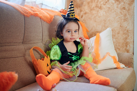 Baby dressed as a witch with Hallowe