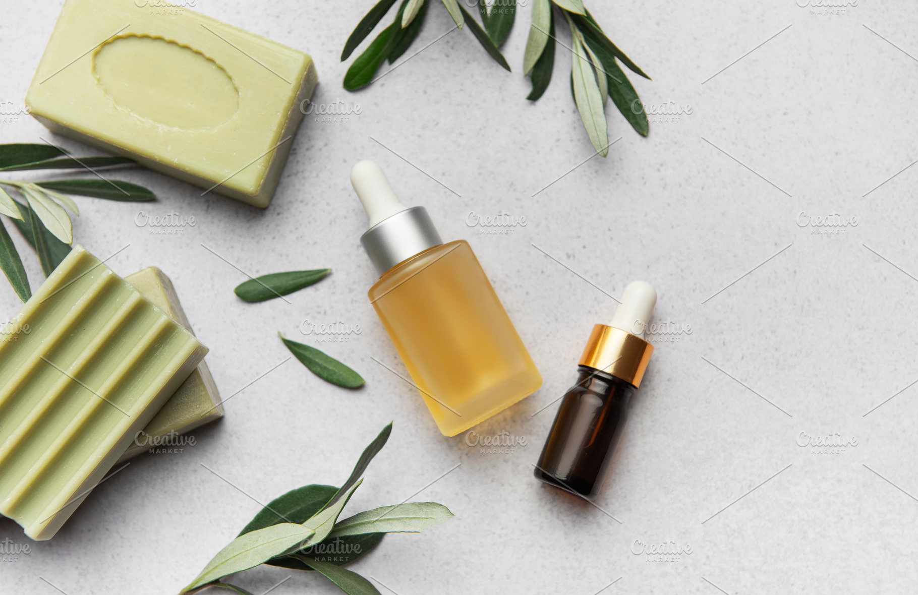 Natural soap, essential oil and olive branches creating relaxing, a Health & Medical Photo by Olena Rudo
