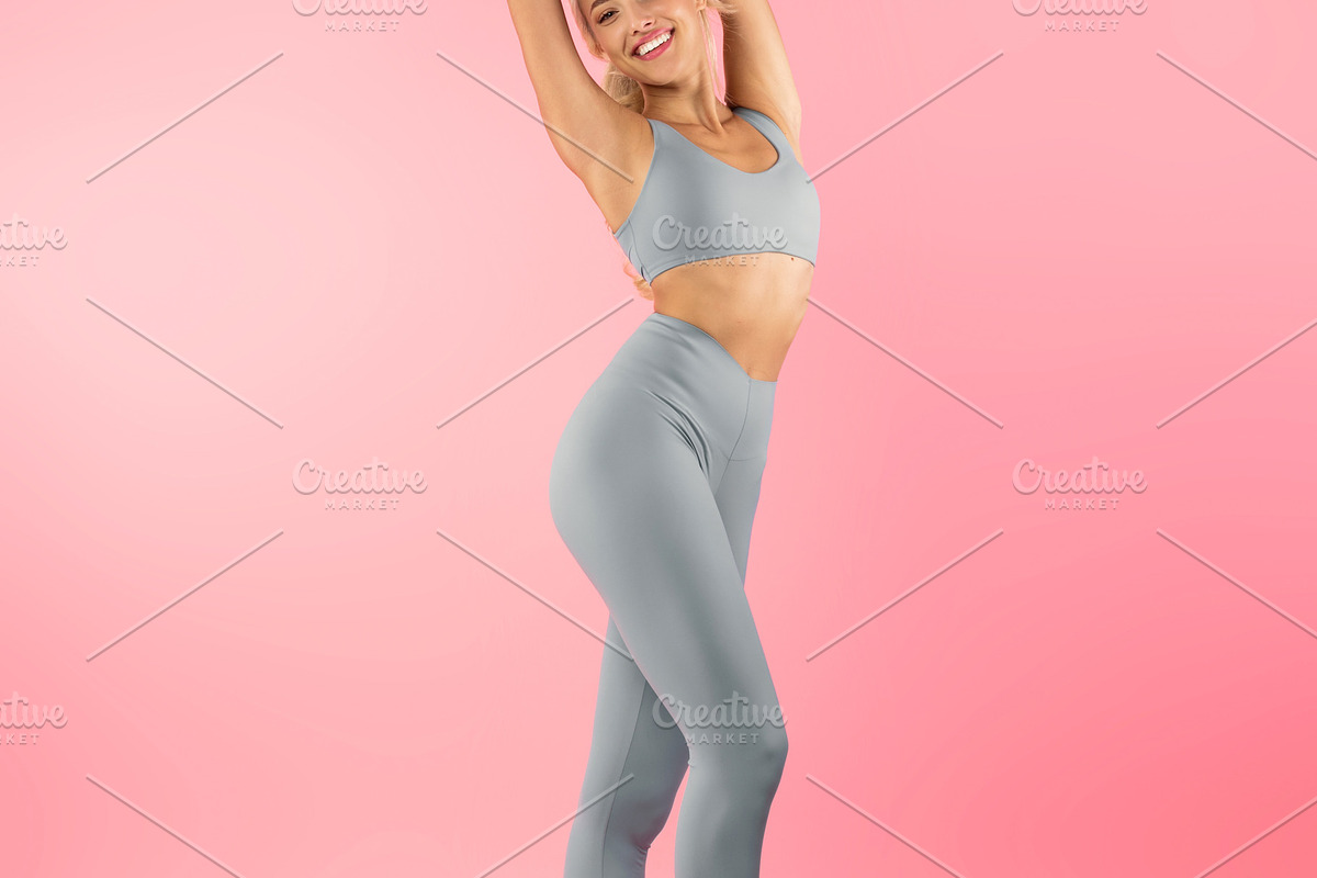 Smiling Sporty Woman Posing Isolated On Pink Background, a Photo by Prostock-Studio (Photo 2 of 2)