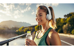 A smiling woman in fitness gear, a Nature Photo by Igor Tichonow