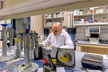Scientist working with data in a lab