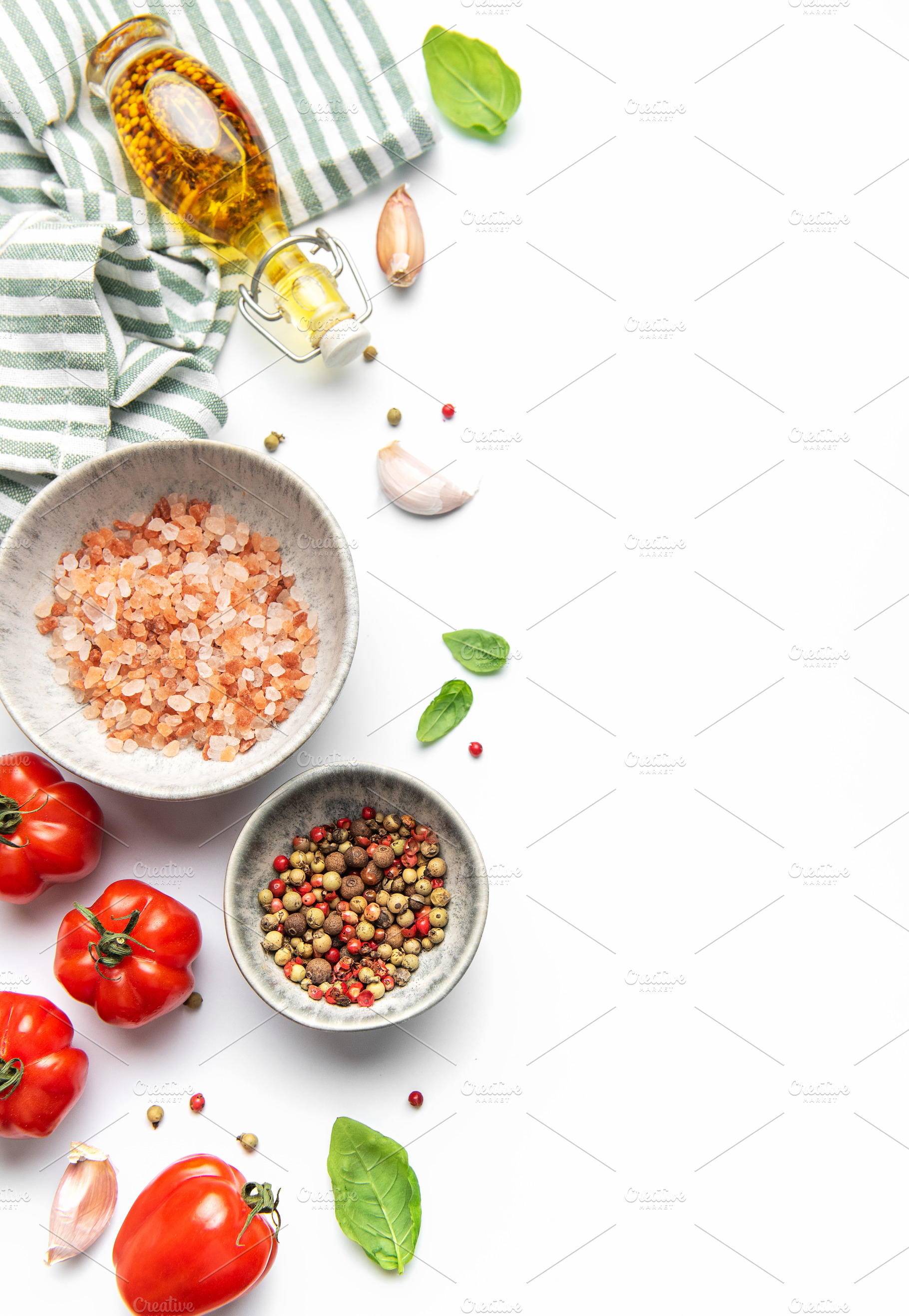 Cooking ingredients and spices creating a healthy food border, a Food & Drink Photo by Olena Rudo