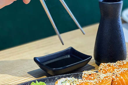 Eating roll sushi, a Food & Drink Photo by Olena Rudo