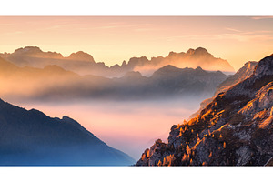 Mountains in low clouds at beautiful, a Nature Photo by den-belitsky