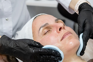 Cleansing procedure beauty treatment female face, a Person Photo by Photo Drive Studio