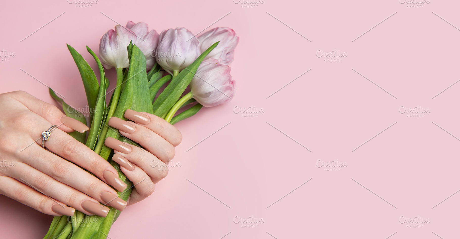 Woman hands with perfect manicure holding beautiful bouquet of p, a Beauty & Fashion Photo by Olena Rudo