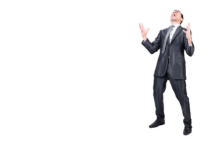 Businessman in suit shouting in, a Business Photo by Iván Moreno STOCK PHOTO